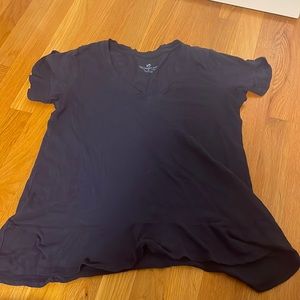 Navy blue Southern Tide T shirt. Ruffles on the sleeves and bottom of shirt